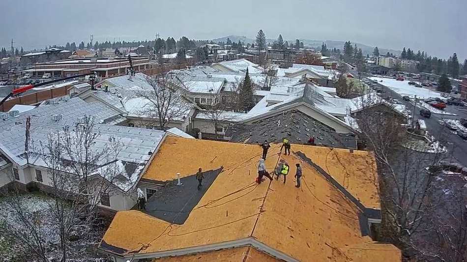 Aerial view of completed commercial roofing project
